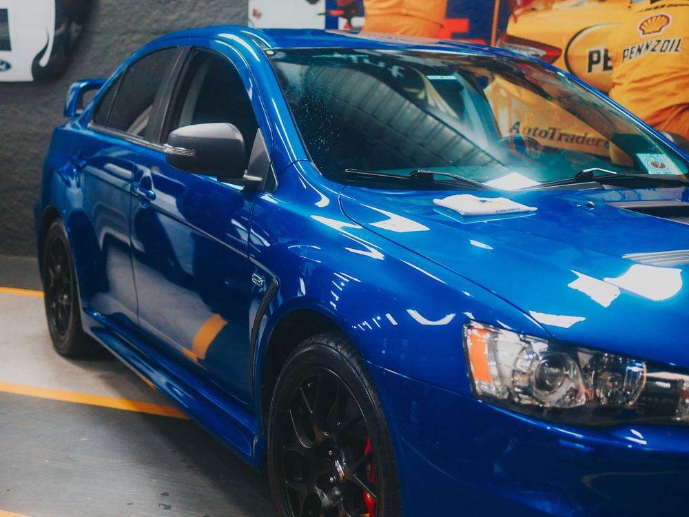 Blue performance saloon with custom detailing